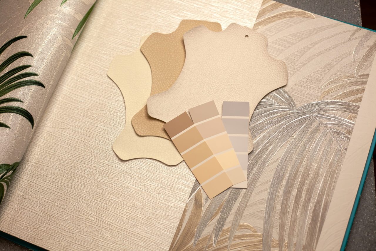 Home interior design. Wallpaper for walls, artificial leather and textiles for furniture making. Renovation and interior planning of the house. Copy space.